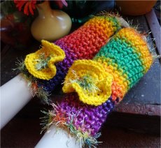 Crochet fingerless mittens with flower